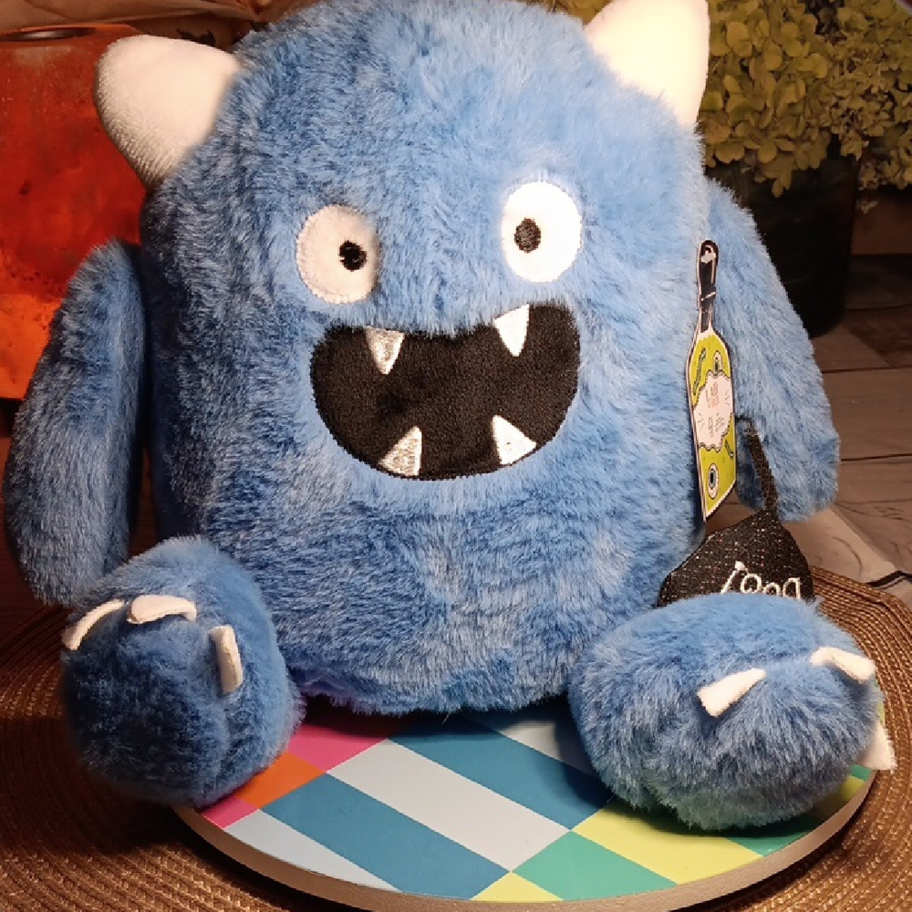 Blue Monster Plush with White Horns